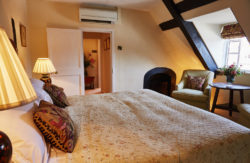 Barnham Opticians Refer a Friend Competition prize at the Spread Eagle Hotel & Spa. Hotel Room showing Bed
